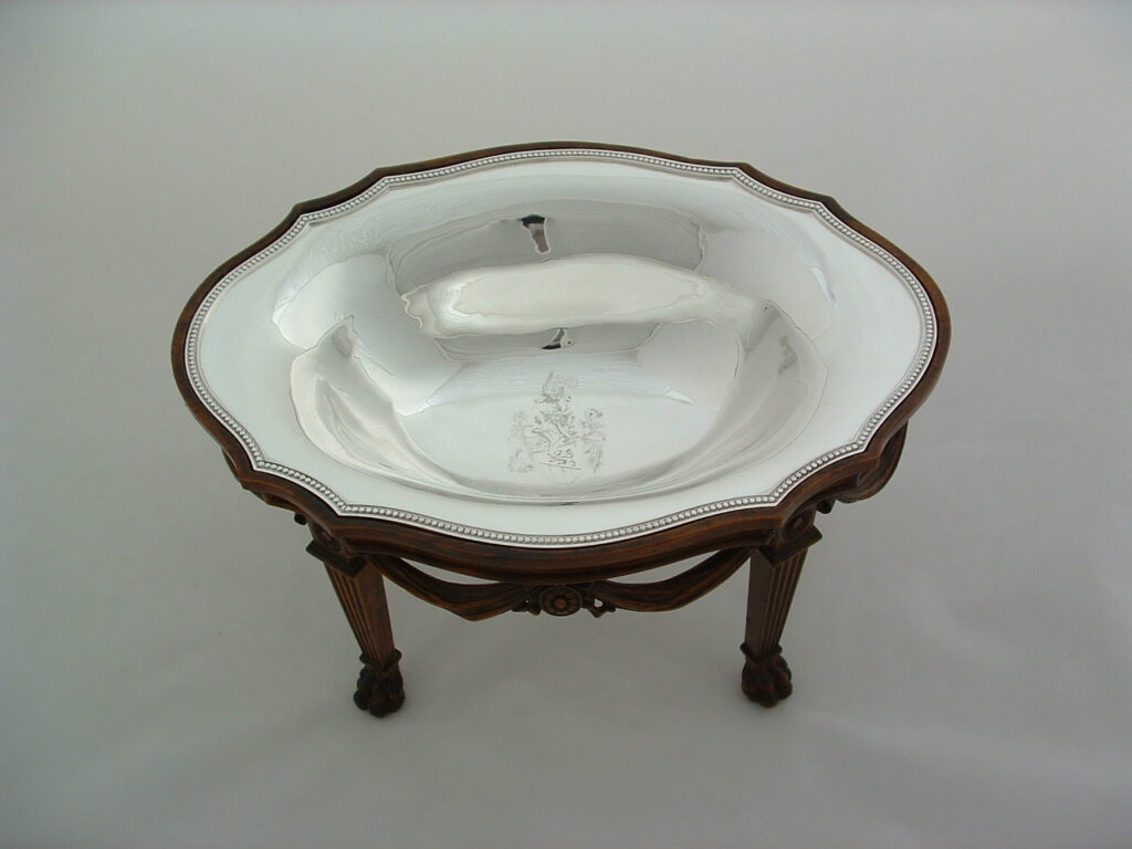 Sterling Silver elegant detailed bowl fitted to wooden Victorian legs