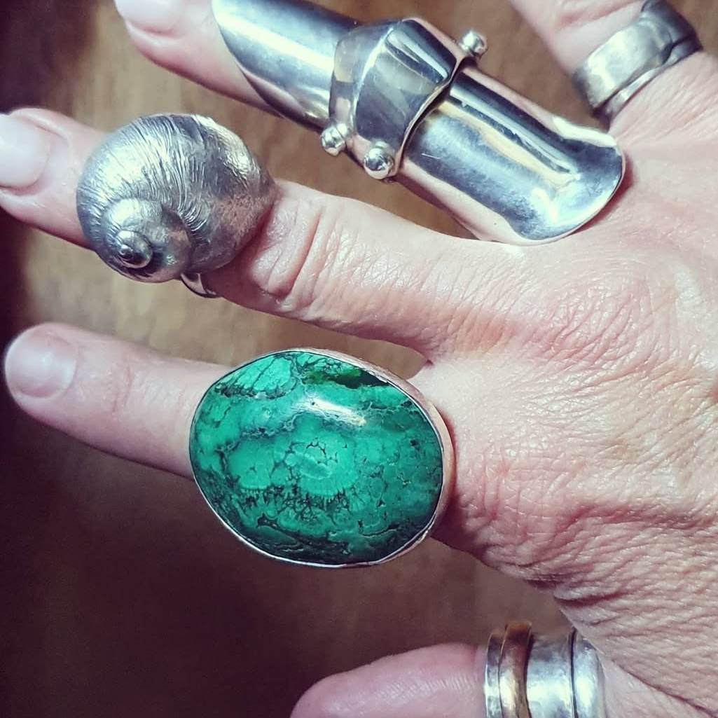 Selection of handmade rings on hand